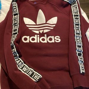 woman’s crewneck adidas sweatshirt